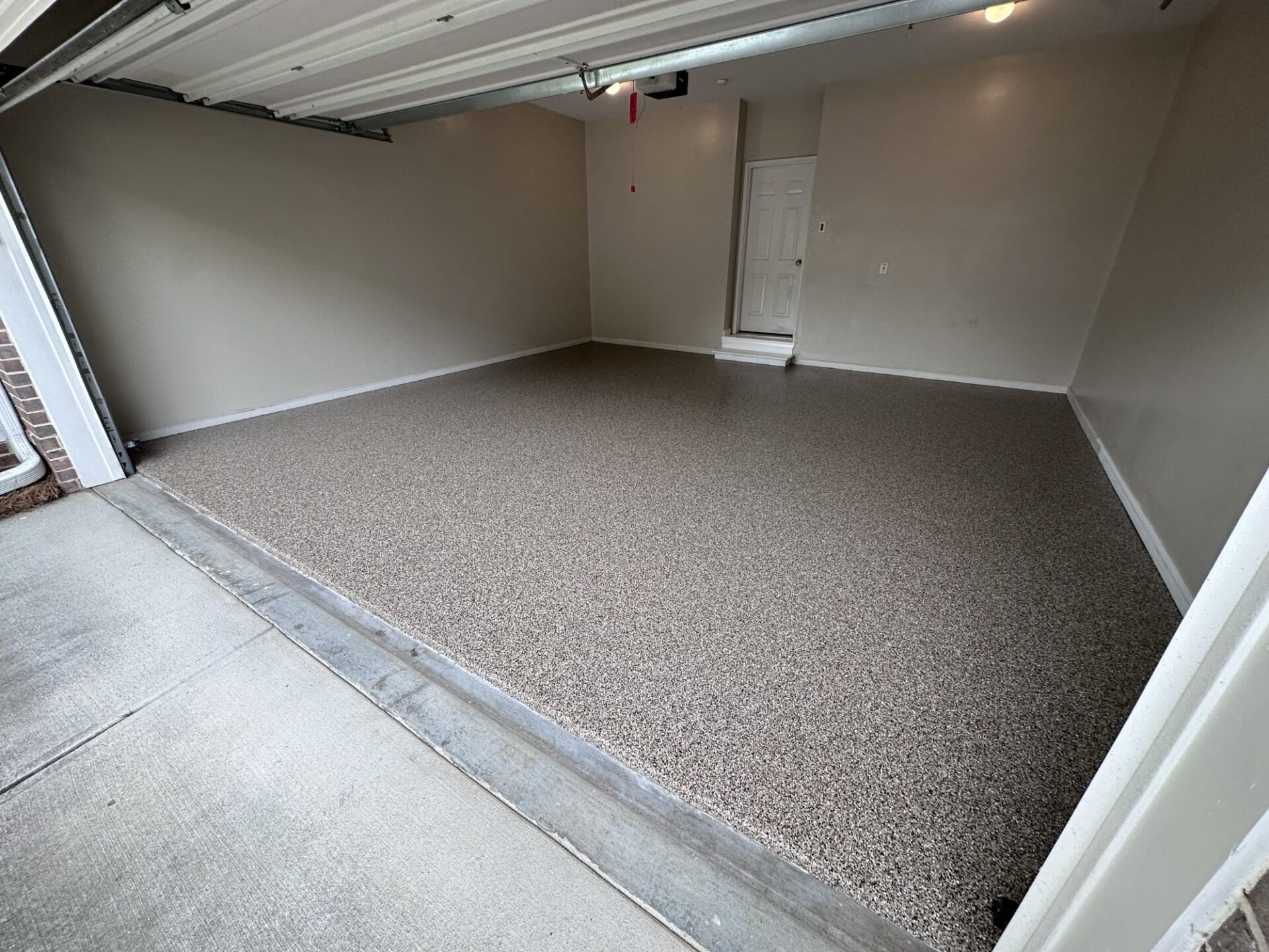 Taupe polyaspartic floor coating