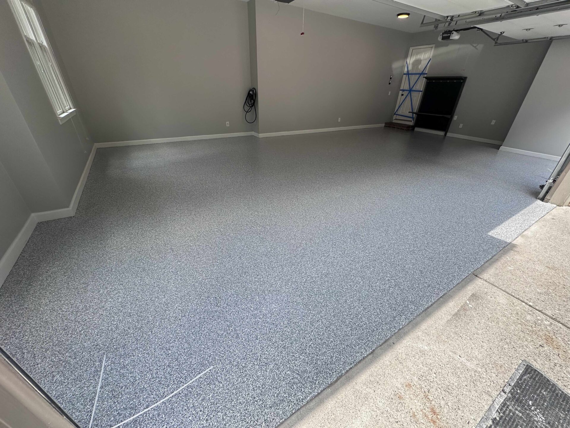 Newly coated polyaspartic garage floor