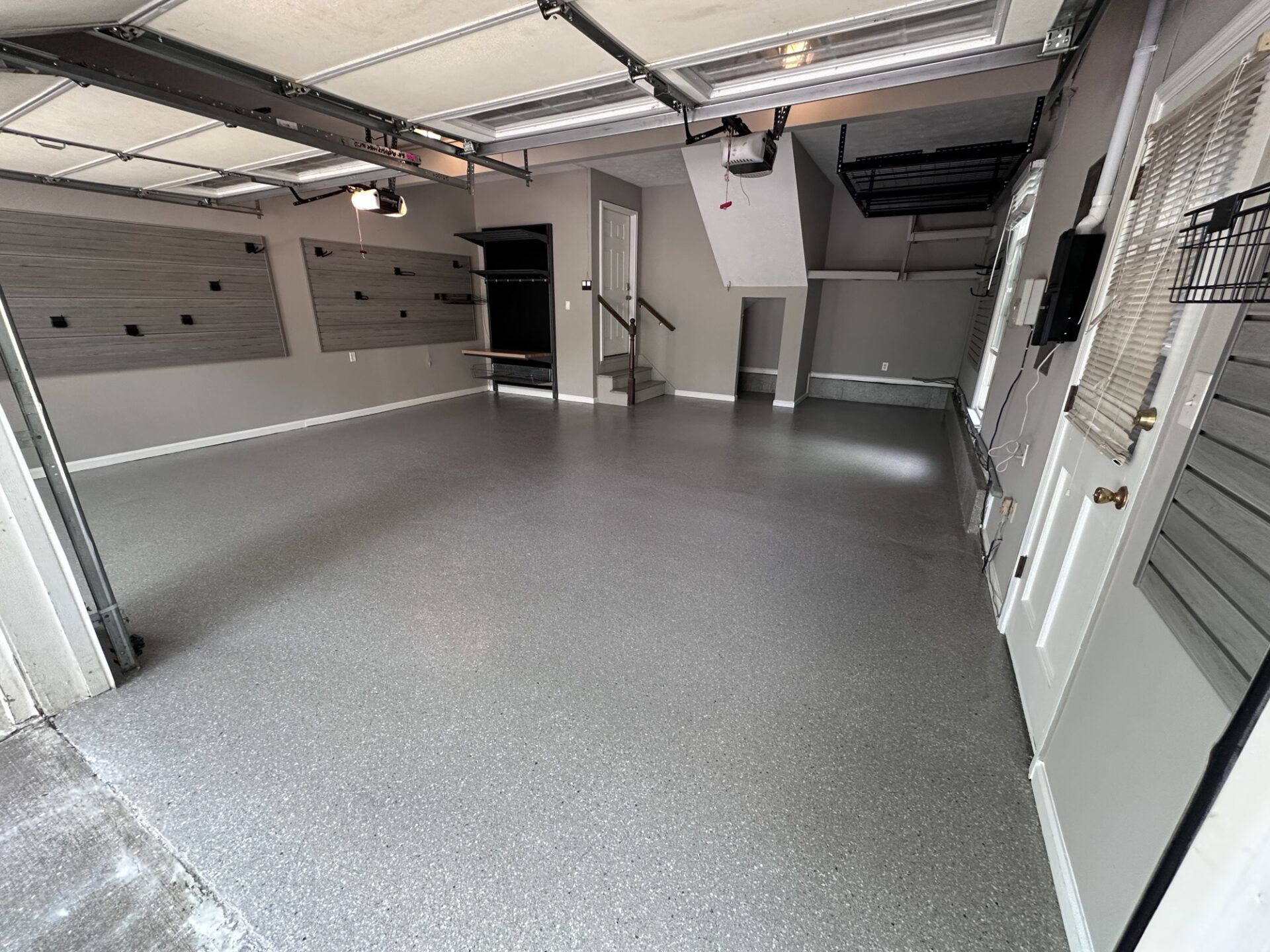Transformed garage with polyaspartic and storage