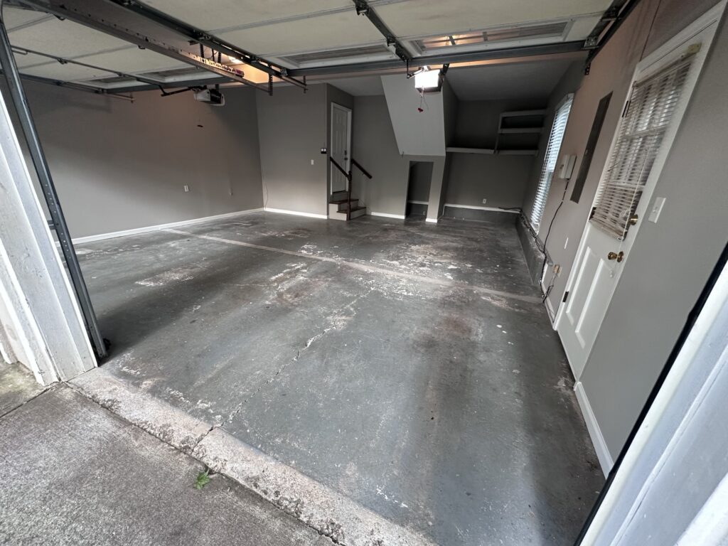 Damaged concrete garage floor