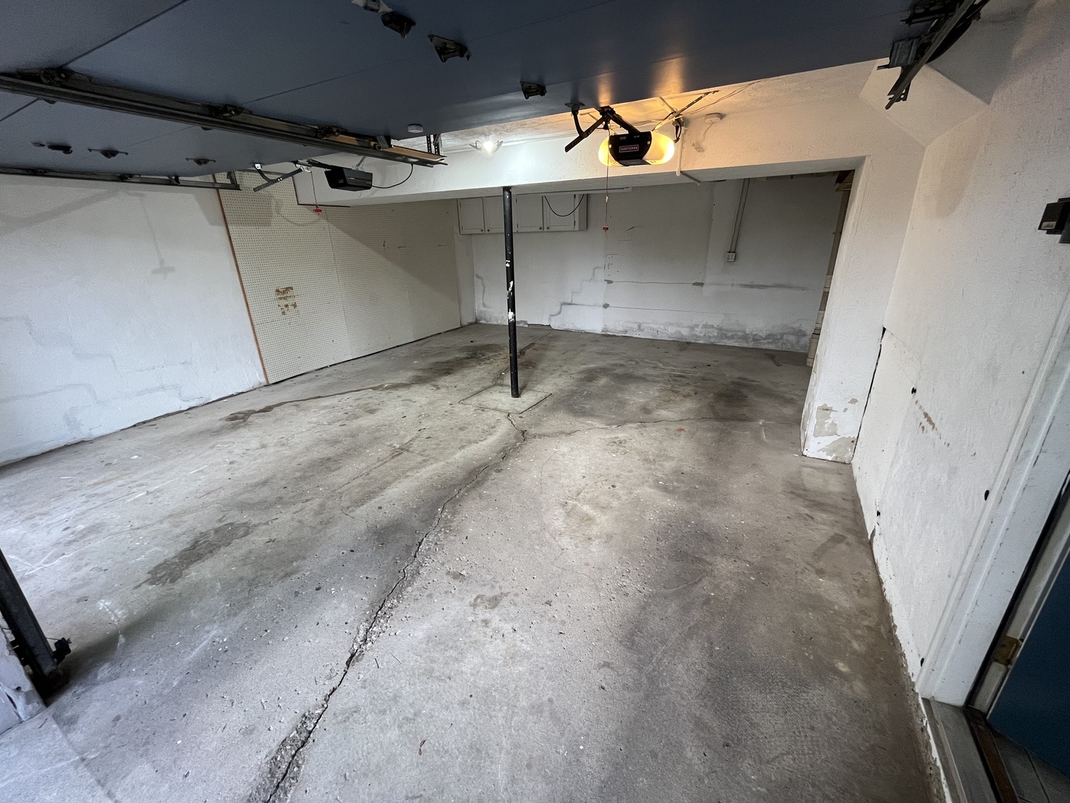 stained, pitted garage floor coating