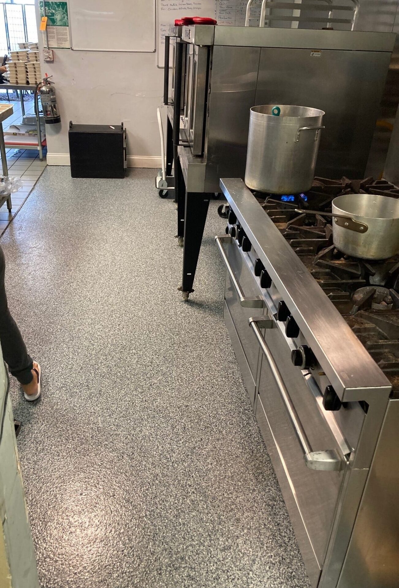 Polyaspartic floor coating in commercial kitchen