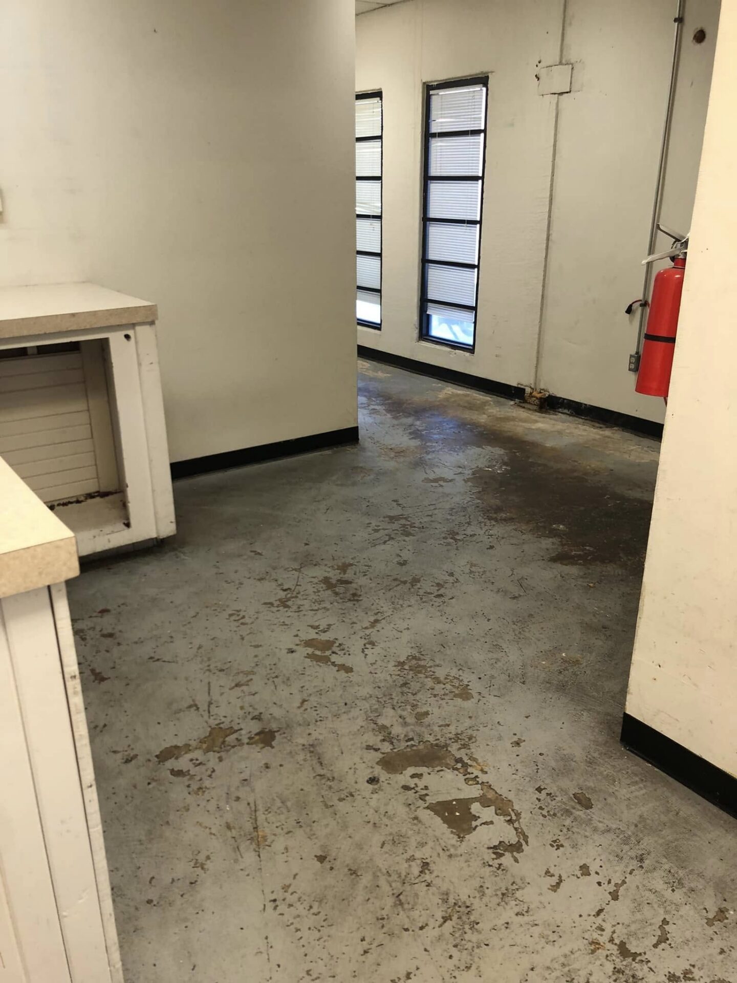 before garage floor coating in mckinney