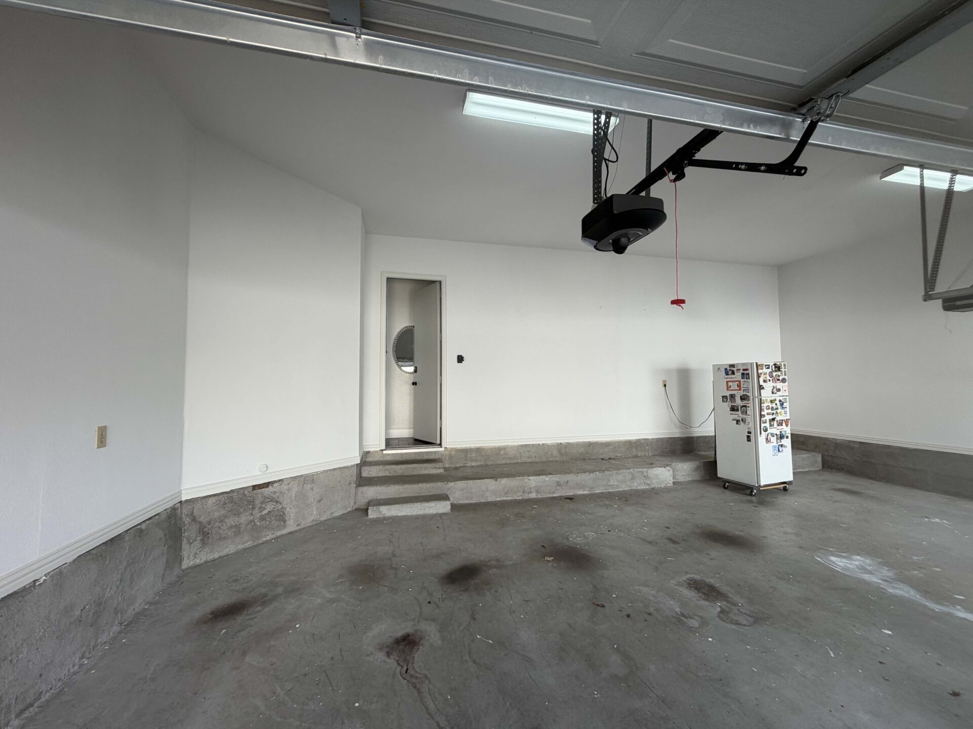 garage before in Allen TX with peeling epoxy