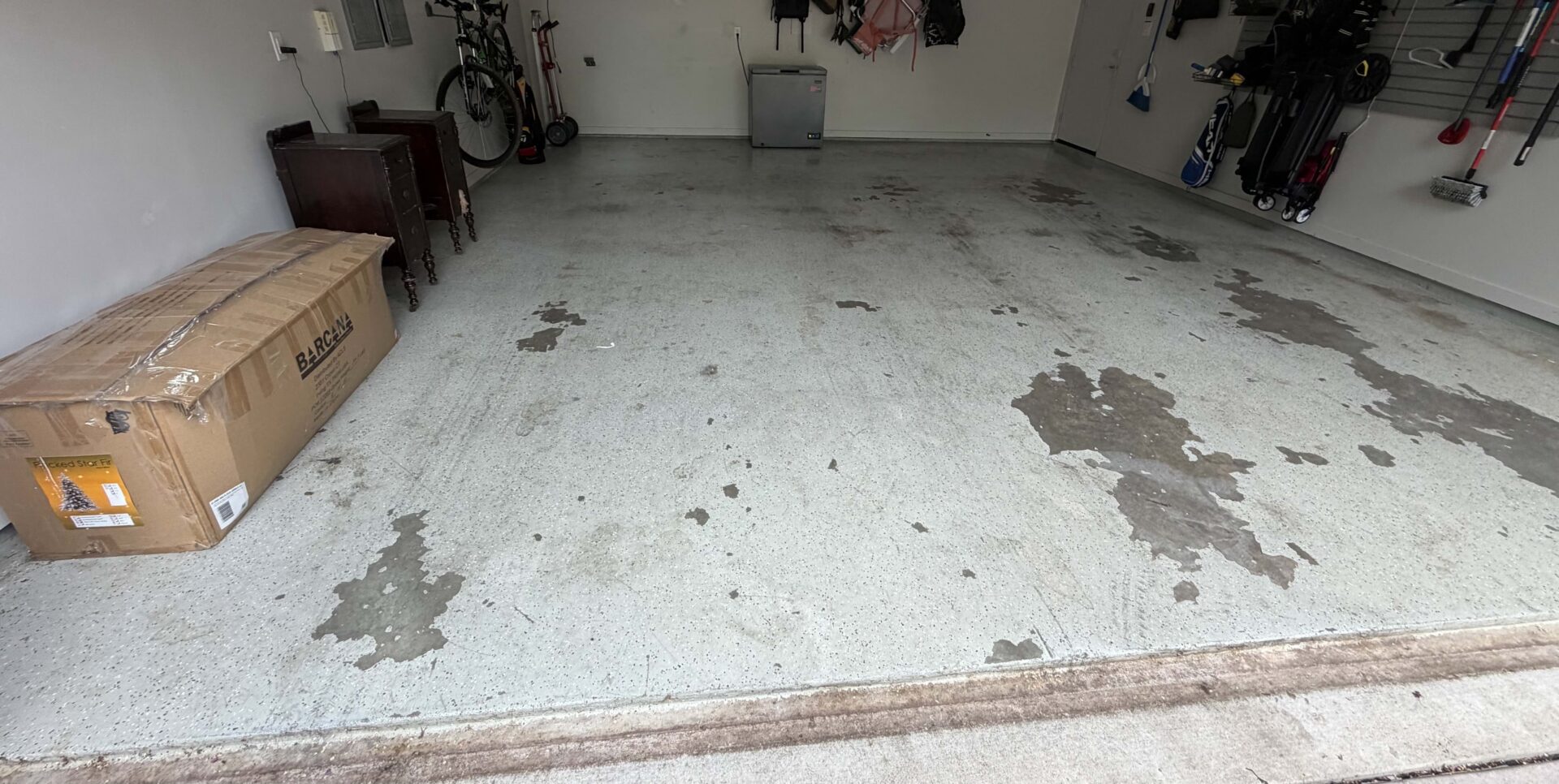 dingy, peeling garage floor