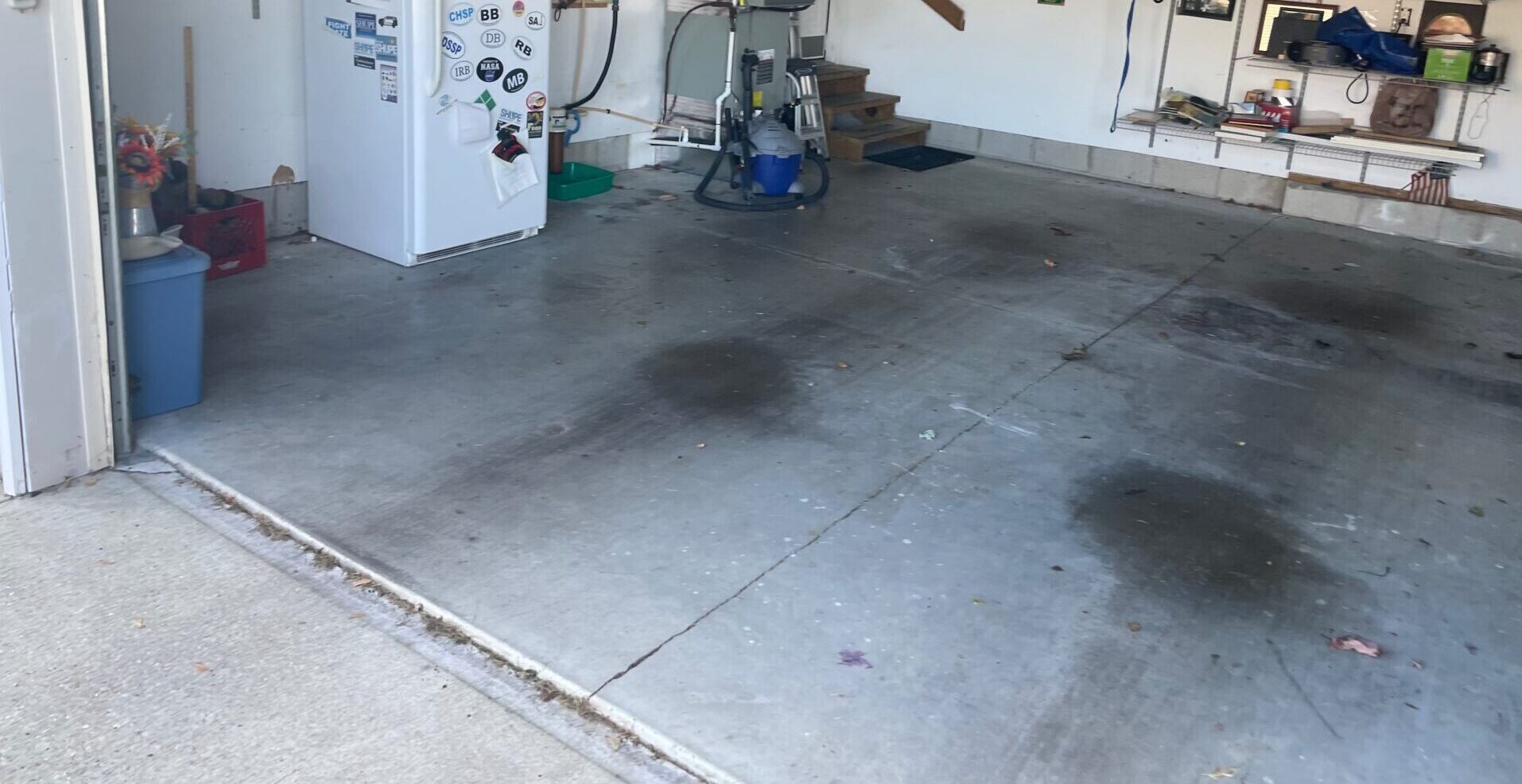 garage with oil stains on concrete