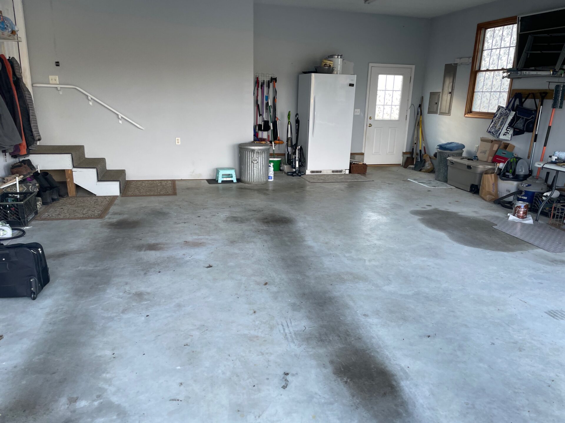 dingy garage concrete with stains