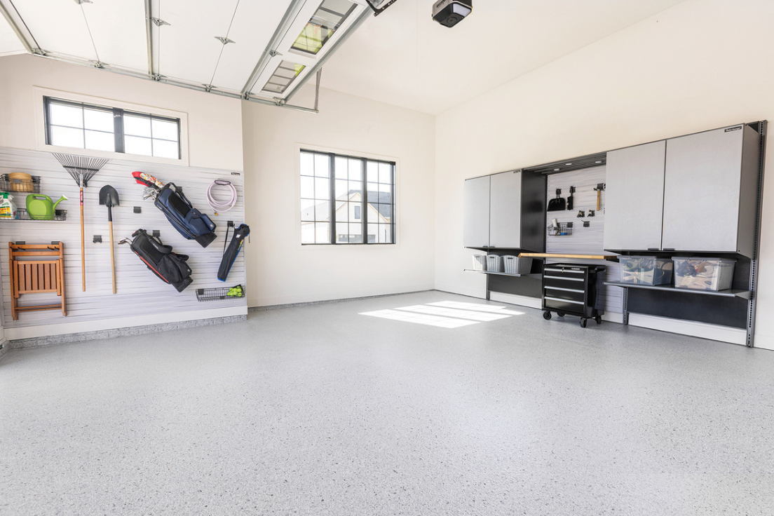 garage with polyaspartic flooring and storage