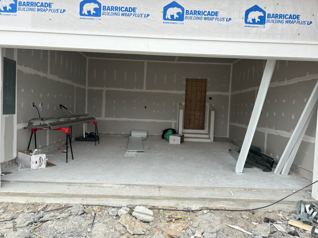 Brand New House Garage with a new concrete before Hello Garage puts down a floor coating