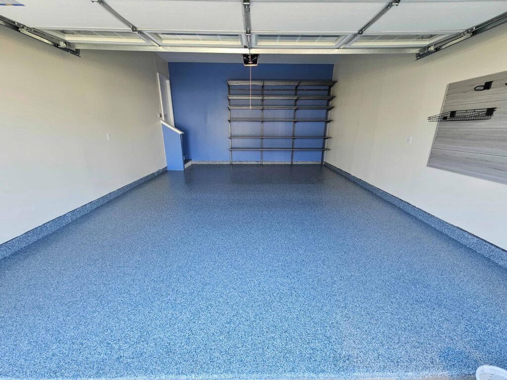 Garage Floor Coating, Shelving and Slatwall Newly Installed in a Milton Garage by Hello Garage