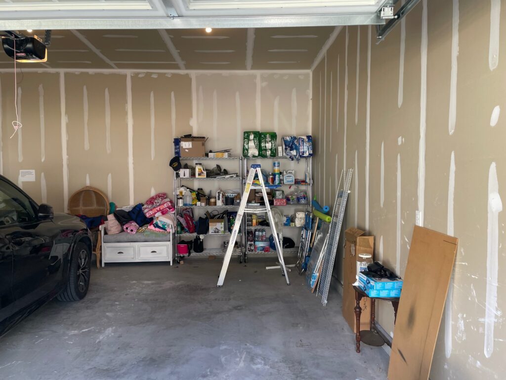 Messy Garage Before Garage Floor Coating and Storage