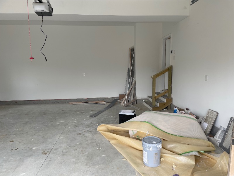 Messy Garage Before a Garage Renovation