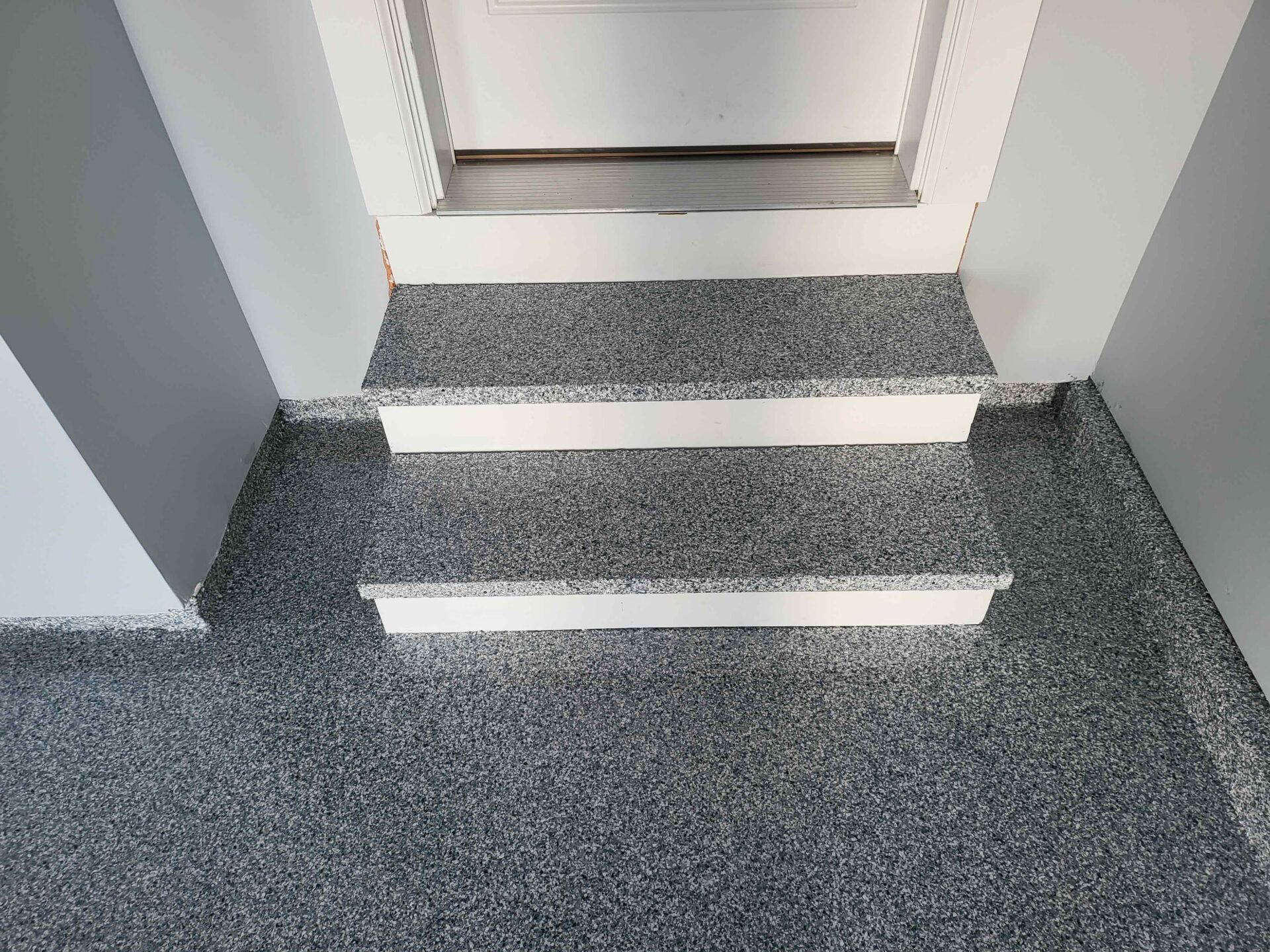 polyaspartic coated garage stairs