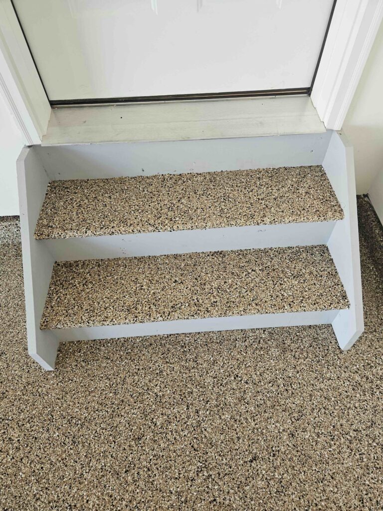 polyaspartic coated garage stairs