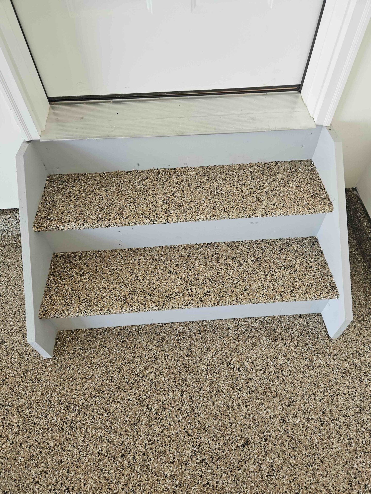 polyaspartic coated garage stairs