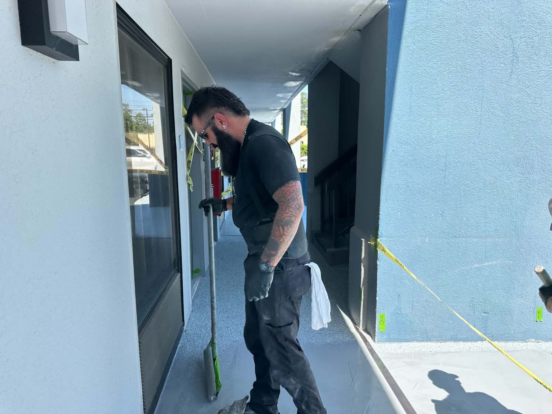 installer working on prepping concrete