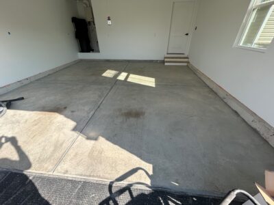garage before a polyaspartic coating in Dover
