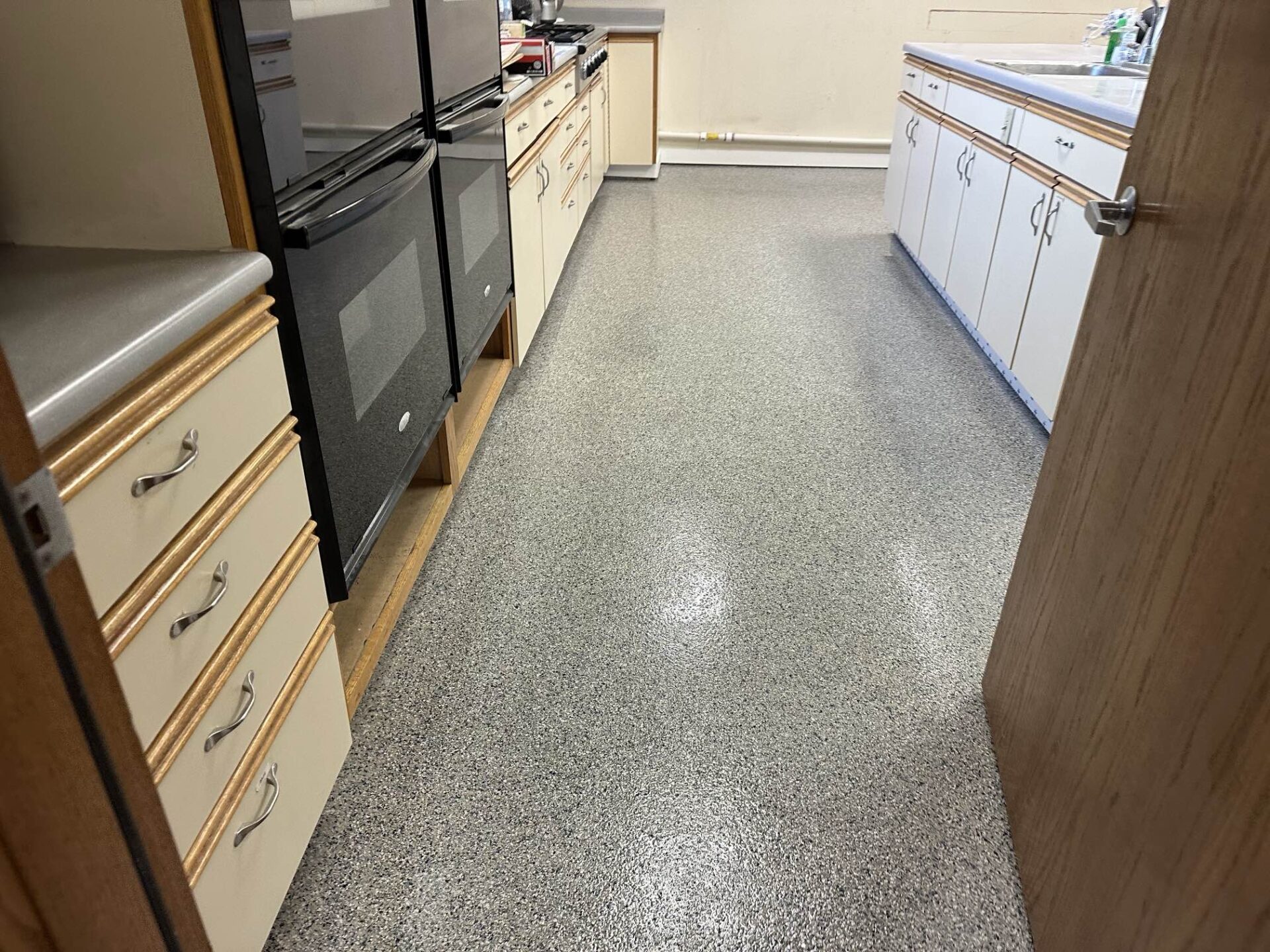 Polyaspartic kitchen concrete floor