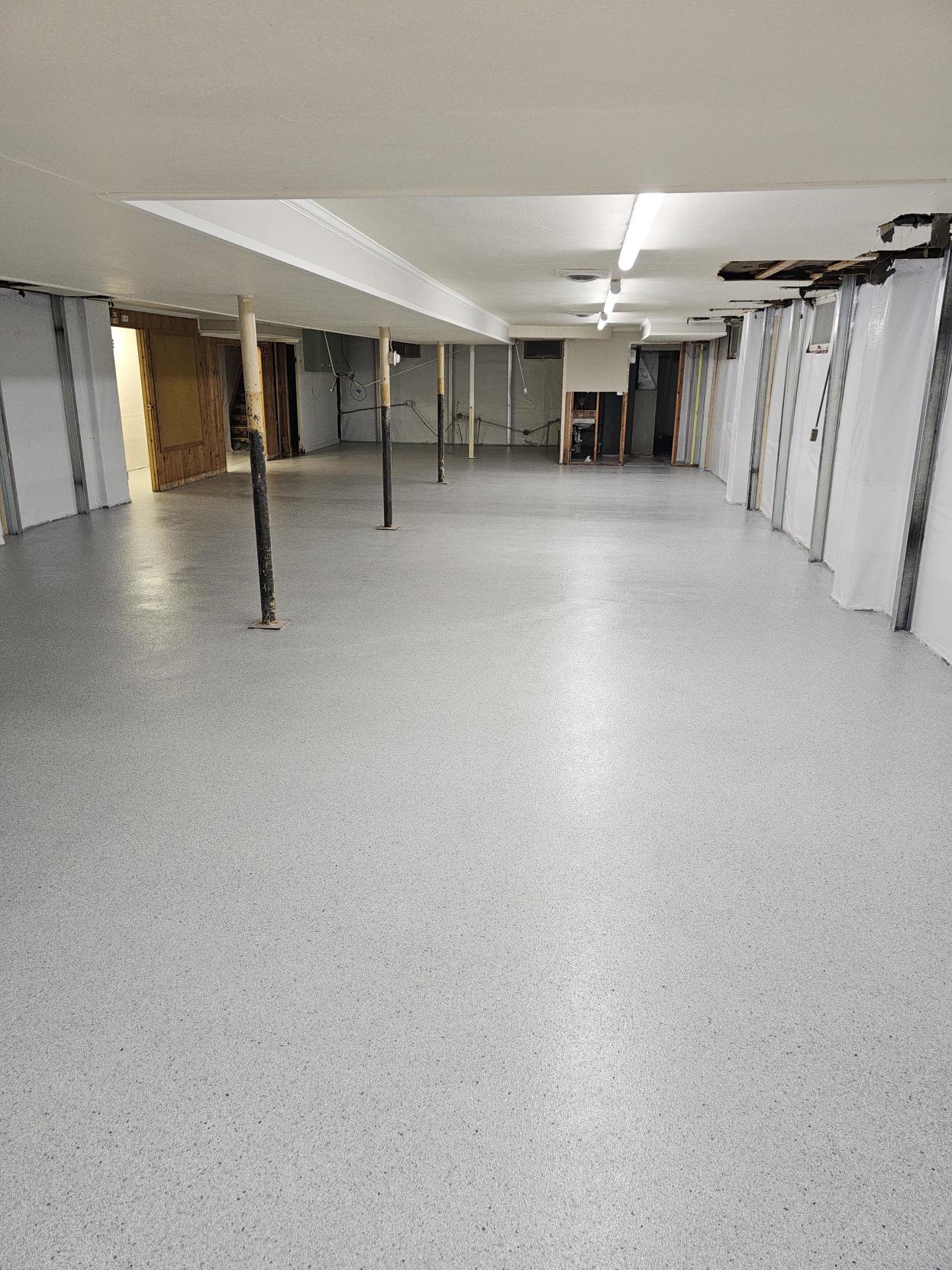 Polyaspartic concrete coating in church basement