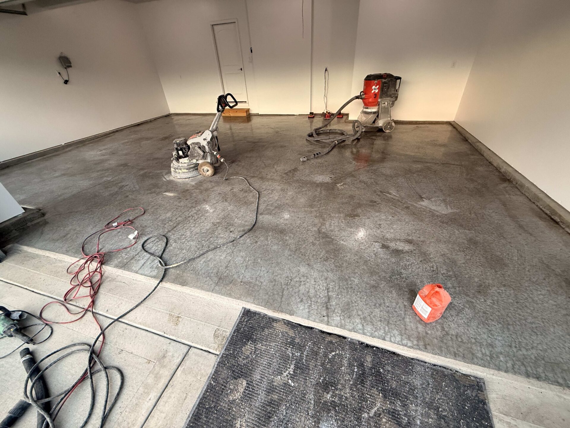 Uncoated concrete in garage