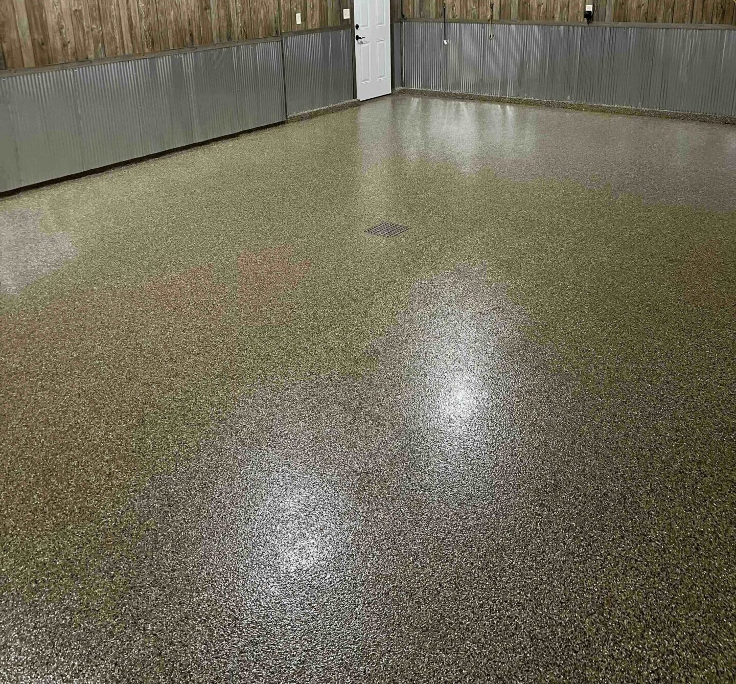 Taupe polyaspartic floor coating in garage