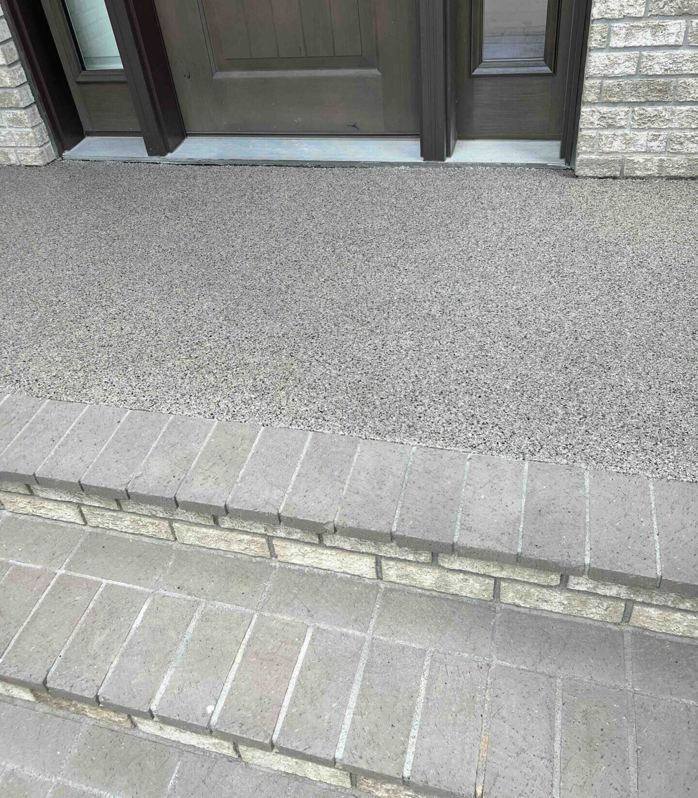 Polyaspartic coated front stoop