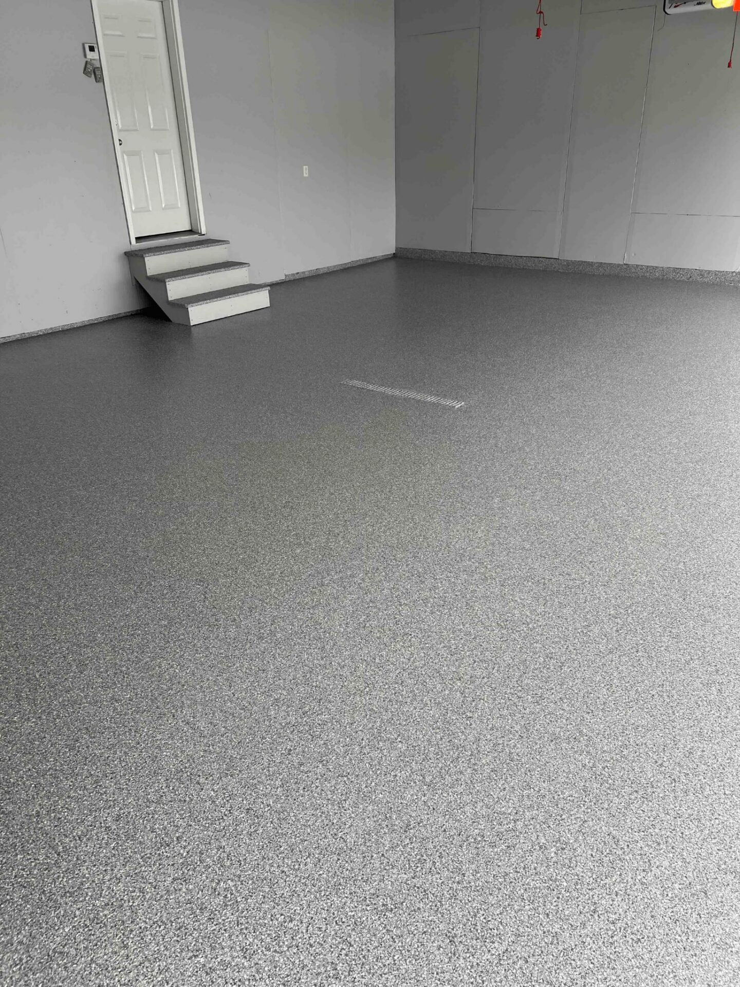 new polyaspartic coated garage concrete