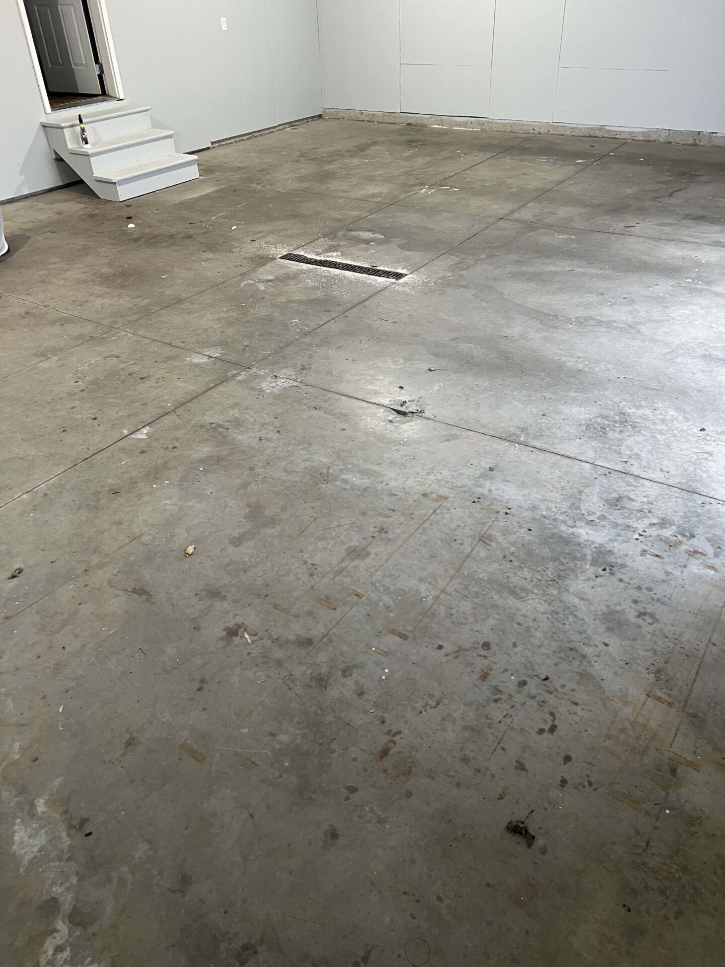 damaged uncoated garage concrete
