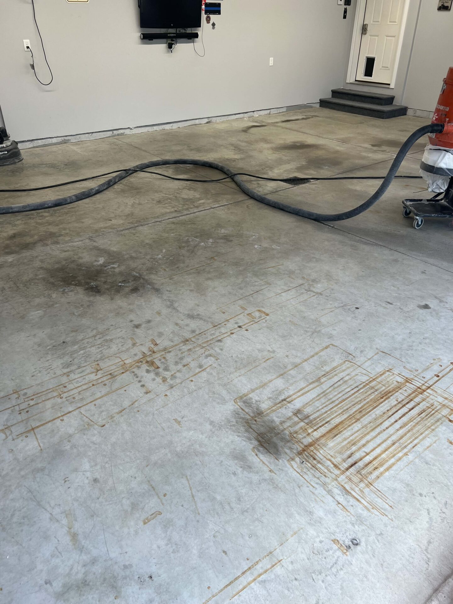 dingy, stained garage concrete