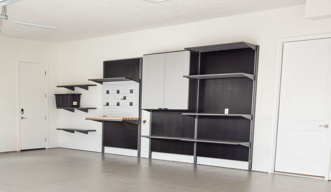 2024 HG Street Of Dreams A – Afters-6-HiRes-1200×800-5b2df79 Garage with gray flooring, cabinets and slatwall