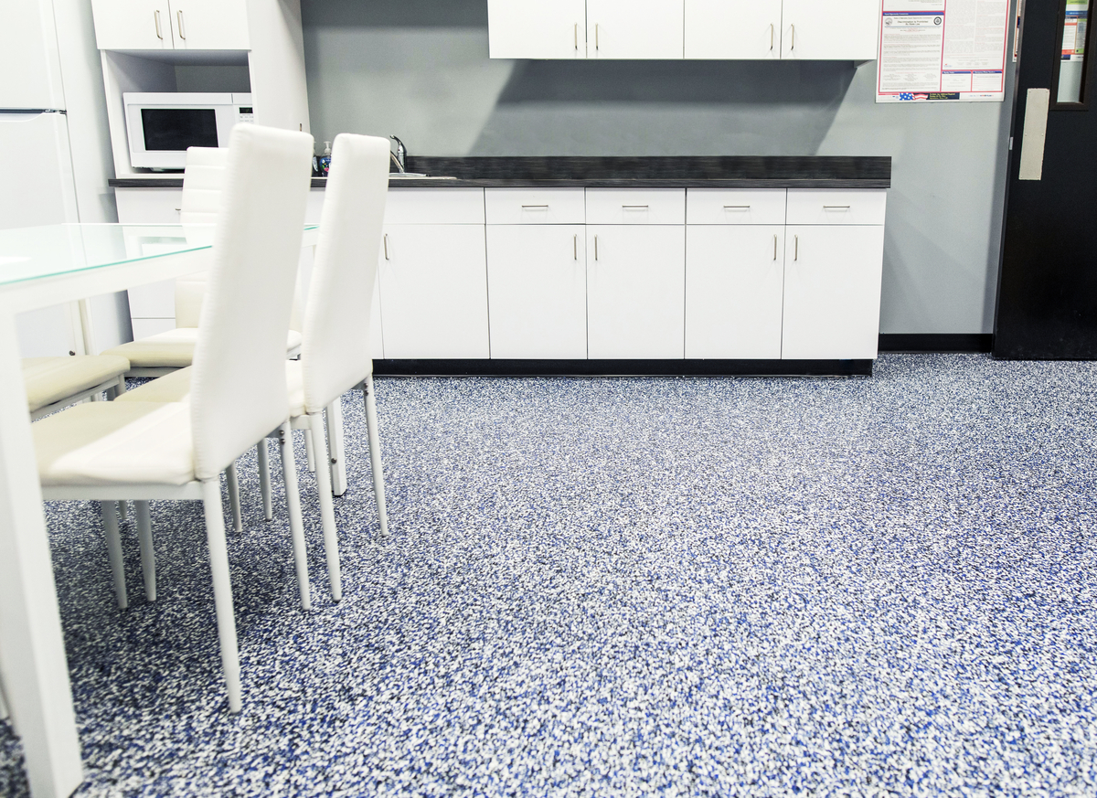 Office breakroom with blue speckled flooring