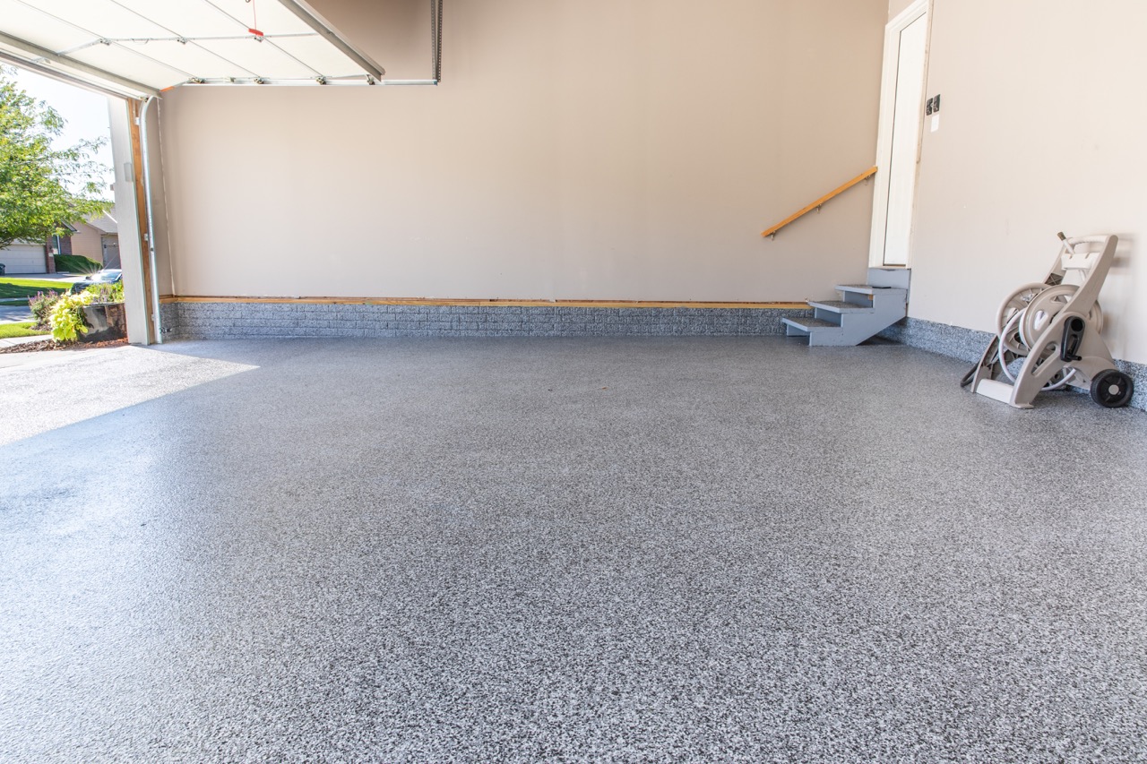 Cookies And Cream Flooring Before-After_02 Large Garage with gray flooring
