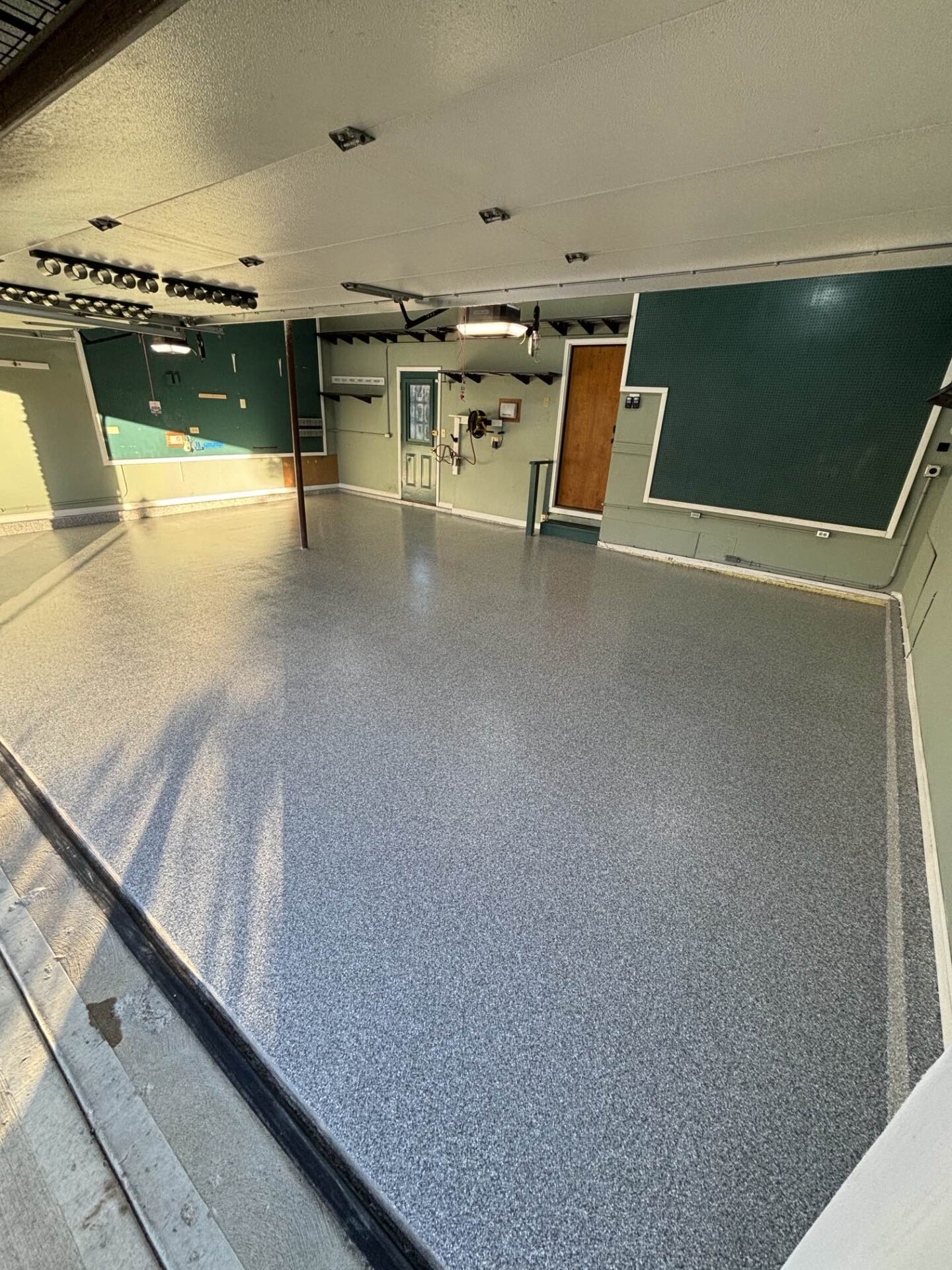 Garage with new gray concrete floor coating