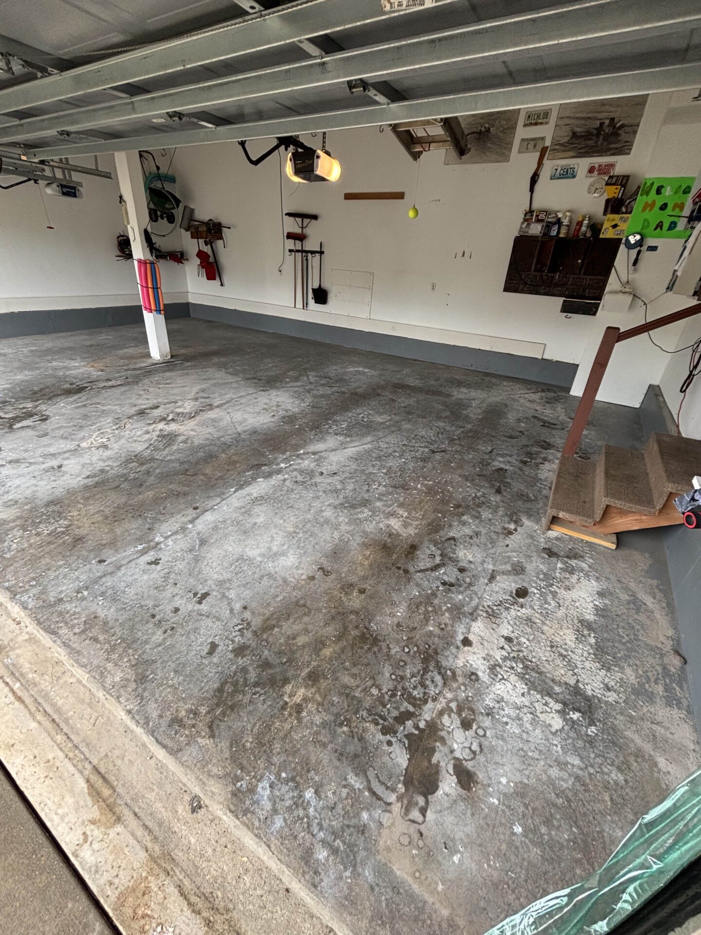 Damaged, cracked garage concrete