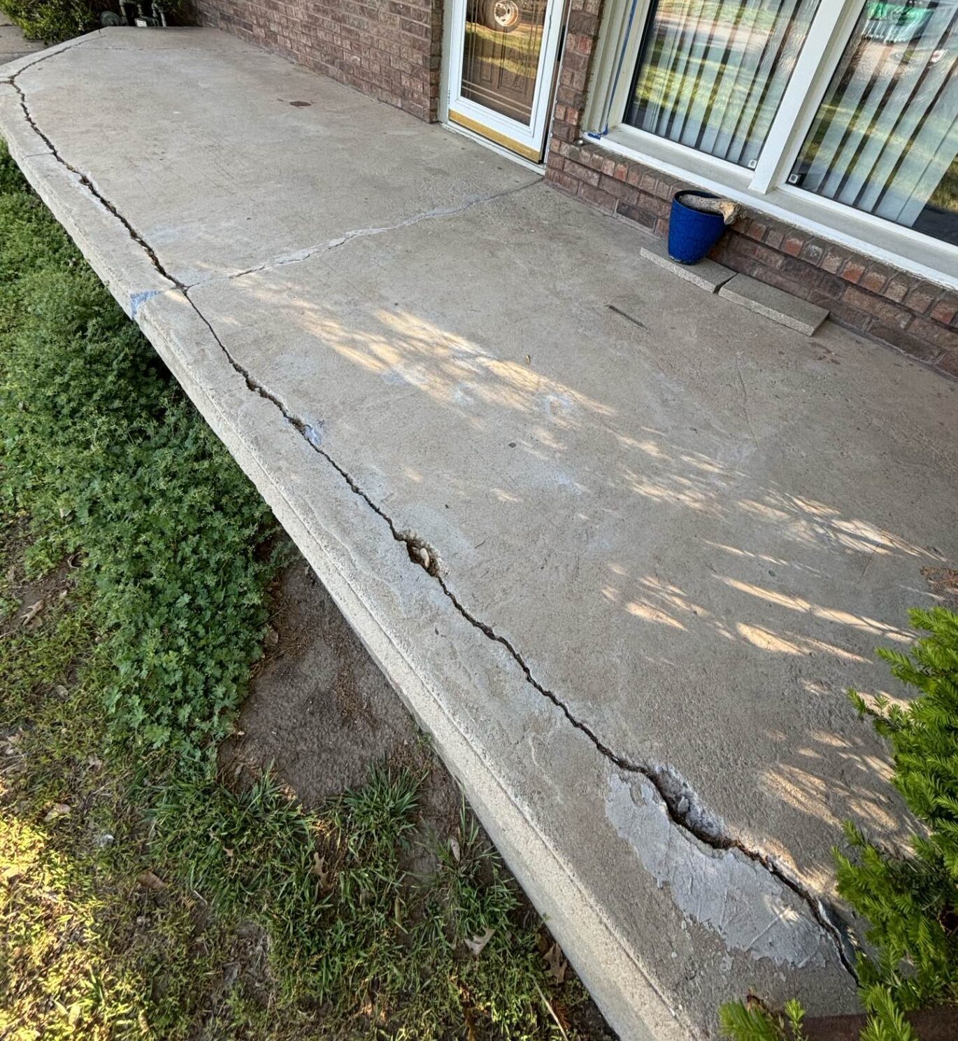 DAMAGED CONCRETE PATIO