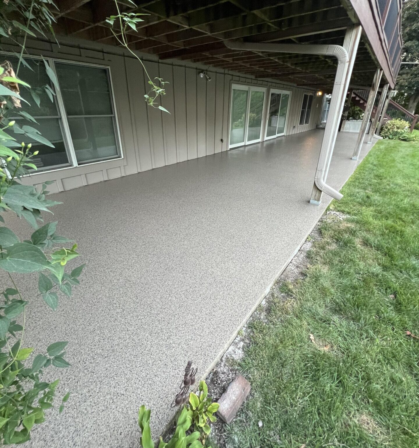 Newly coated polyaspartic concrete patio