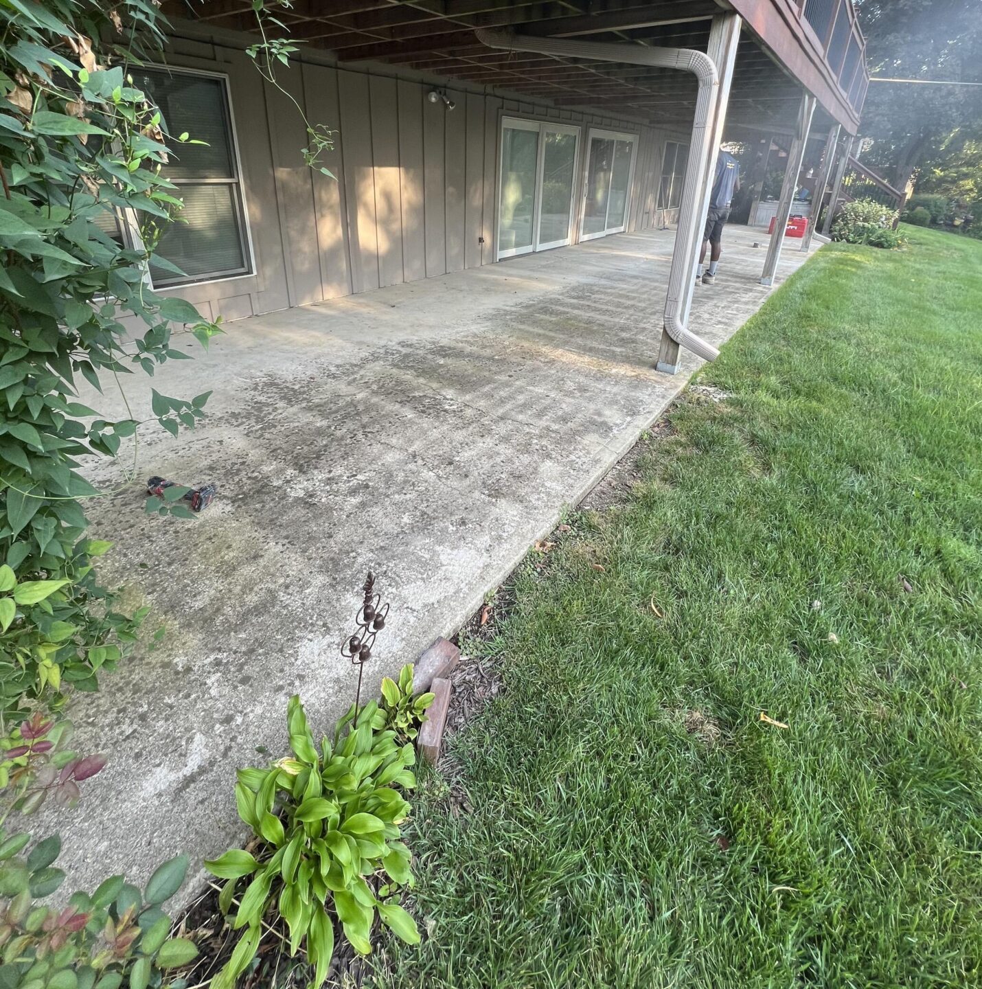 Outdoor patio with bare damaged concrete