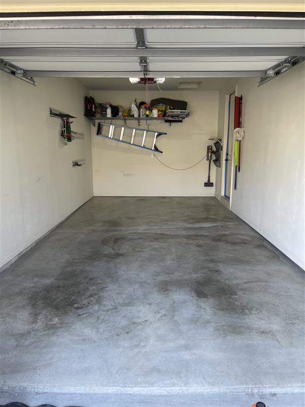 stained, old garage concrete