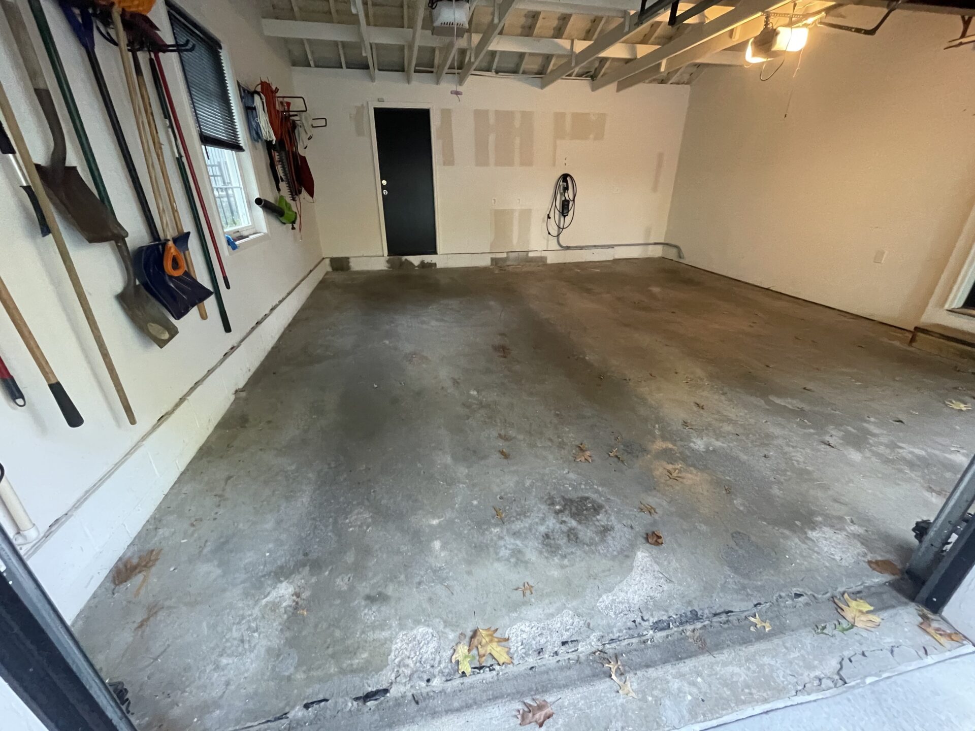 Dingy, stained garage concrete