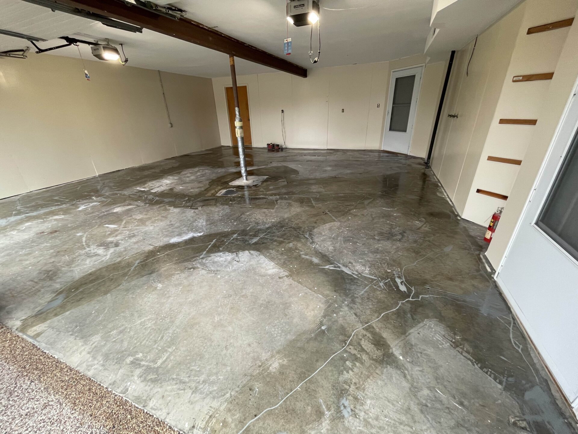 Dingy, cracked garage concrete