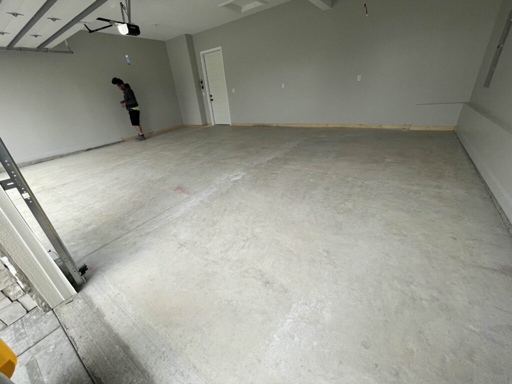 dingy garage floor in liberty before an epoxy coating