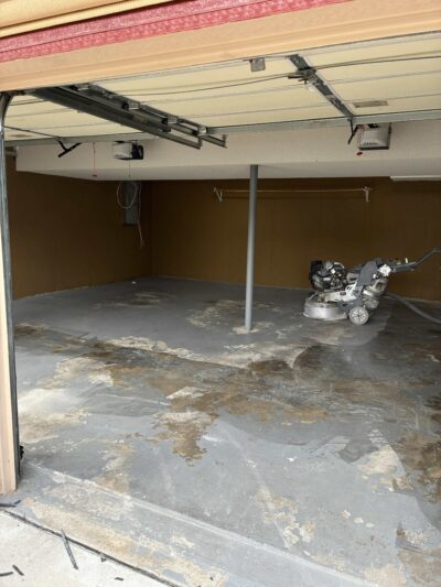 garage floor peeling epoxy before photo in grandview