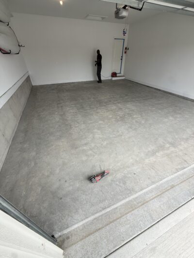 garage before concrete coating in Olathe