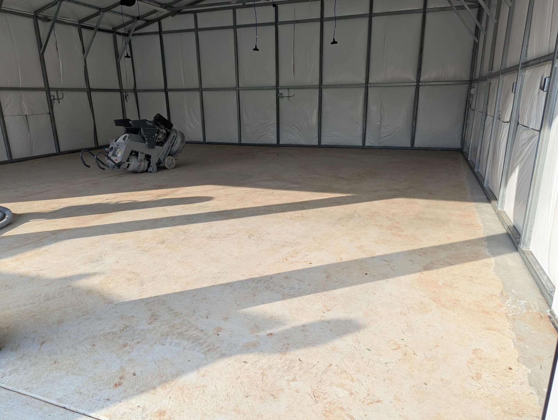 Uncoated concrete garage flooring
