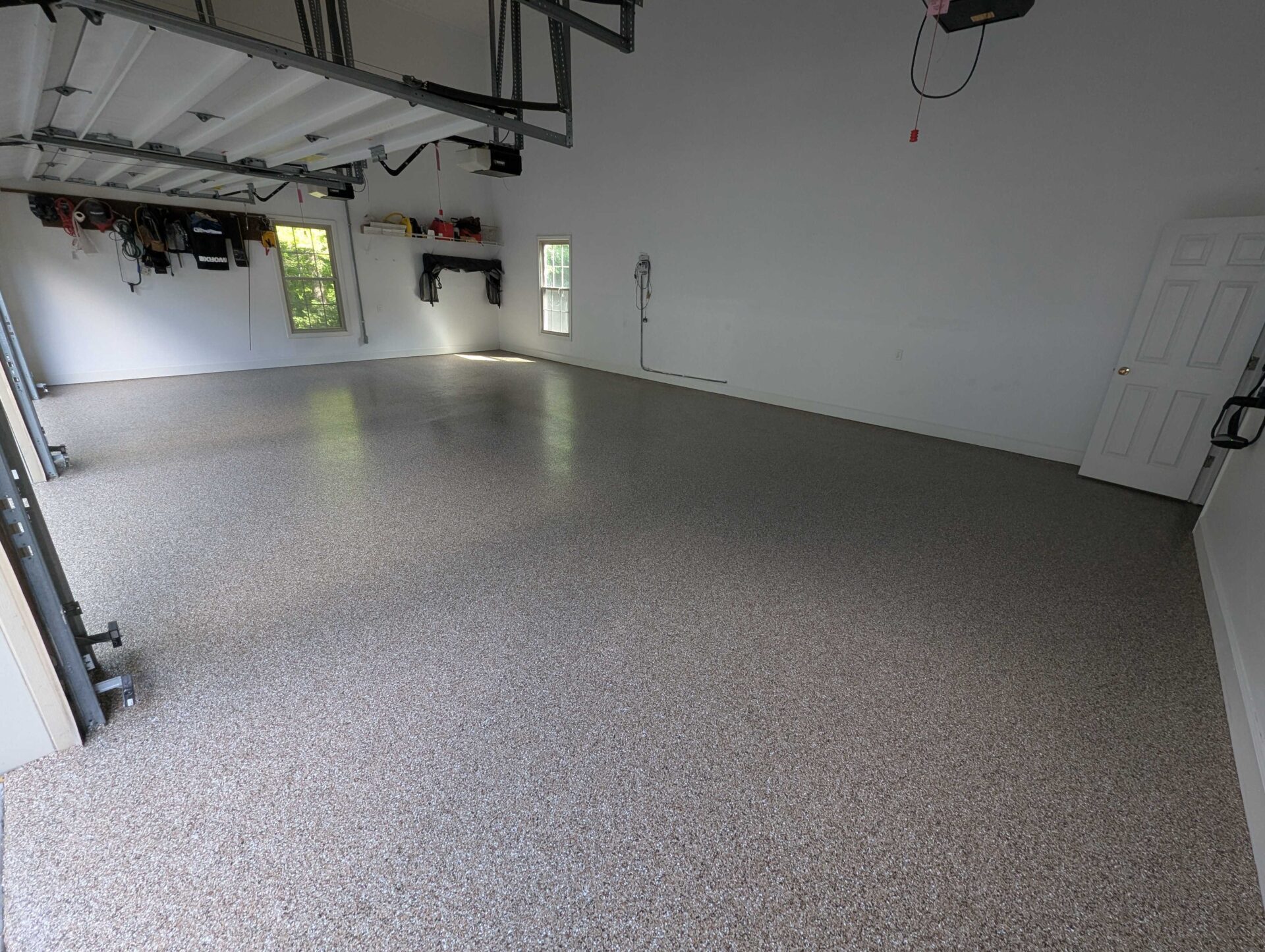Garage with Taupe polyaspartic floor coating
