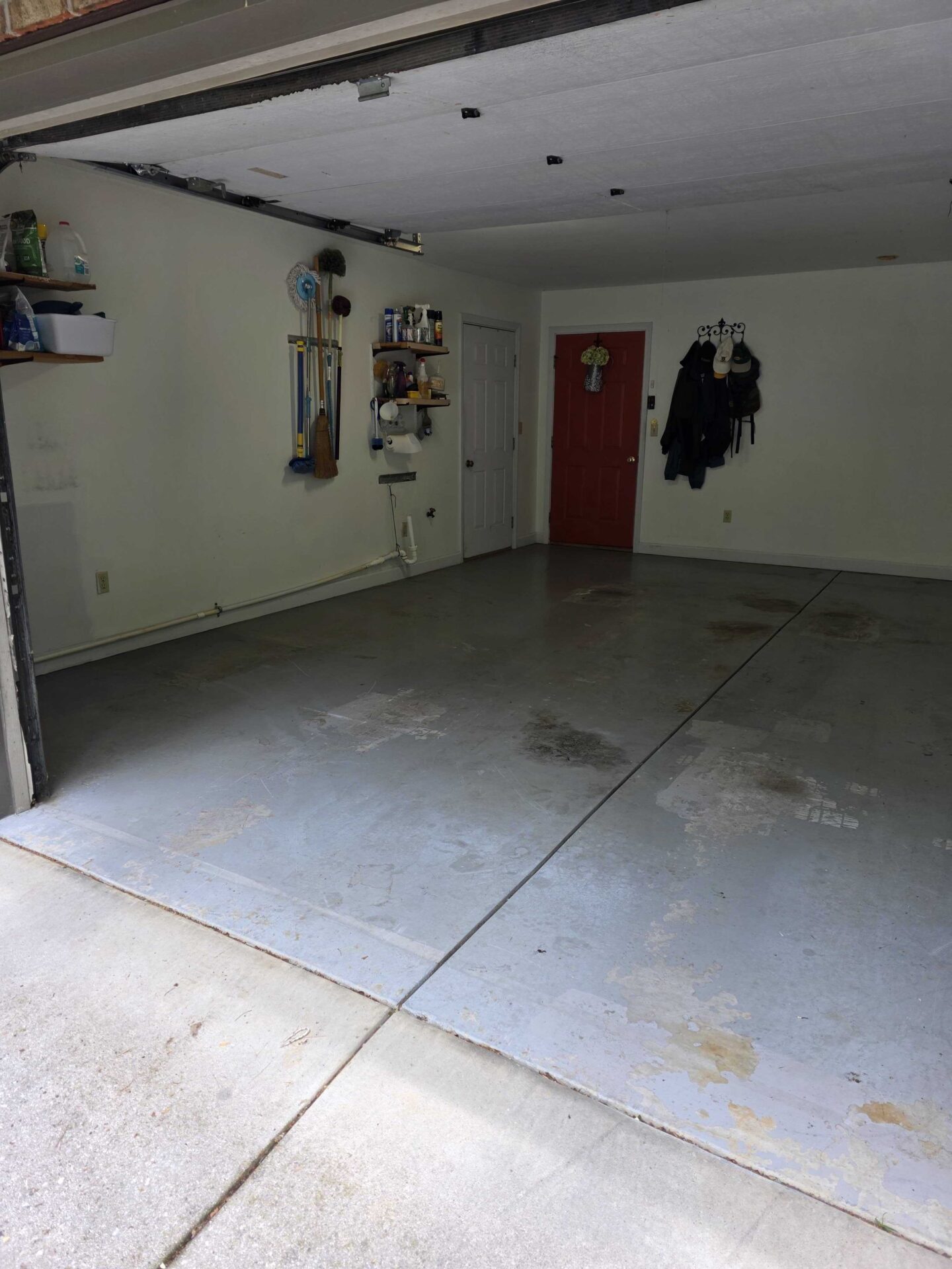 Stained and cracked concrete in garage