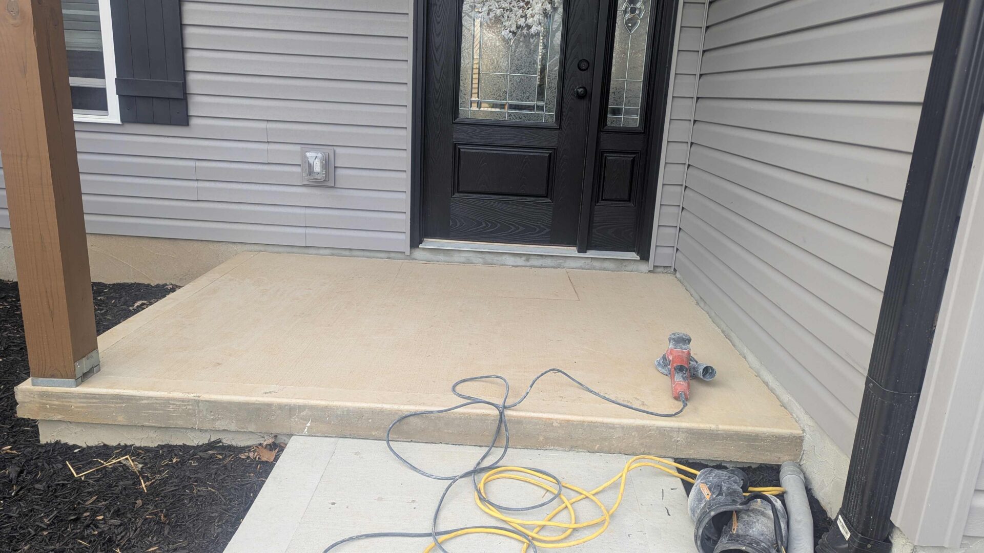 Porch before a polyaspartic coating in Kodak TN