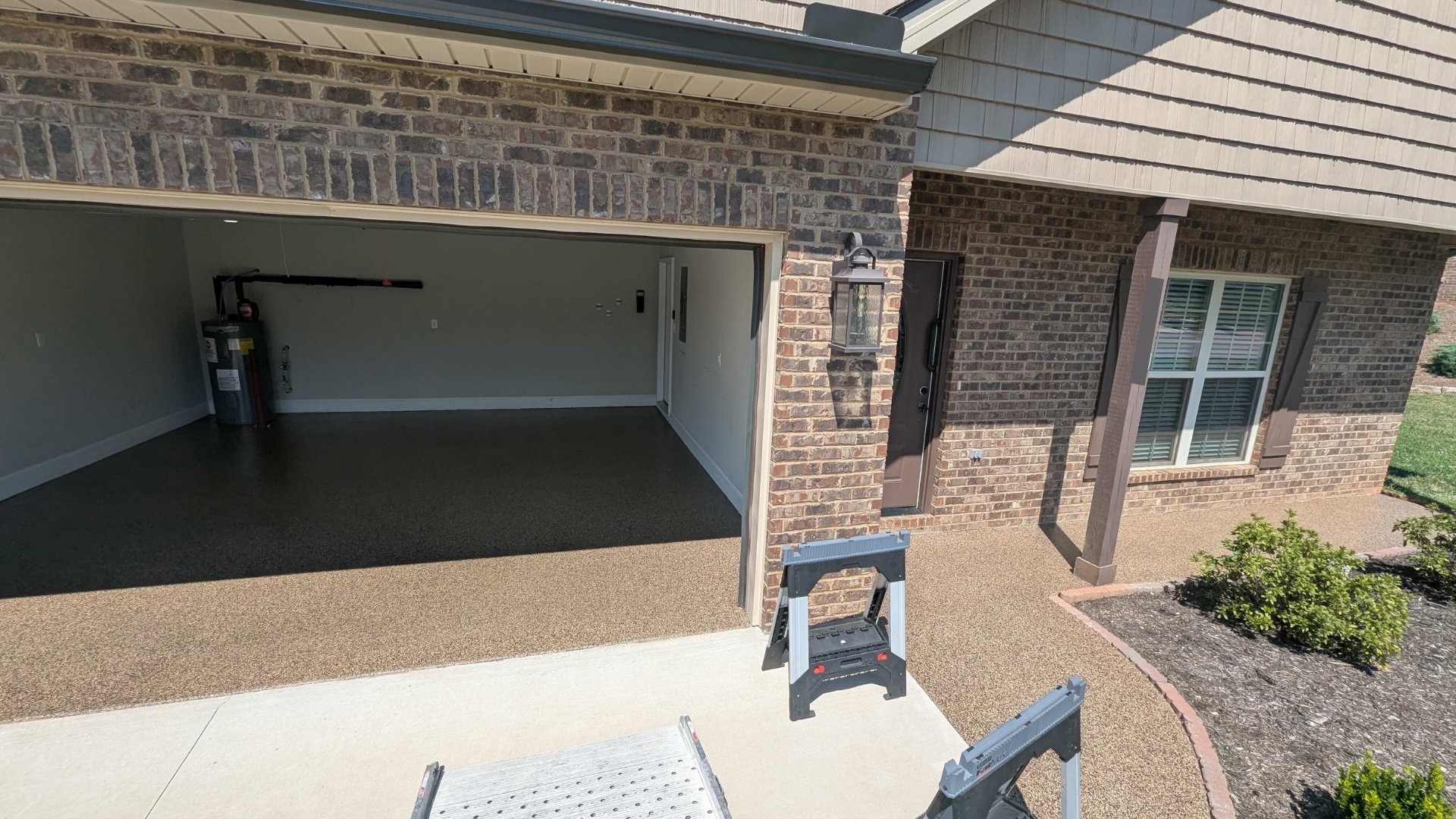 concrete coated garage and porch