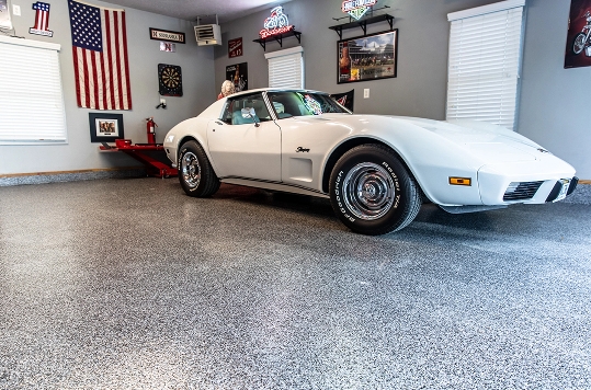 Garage with a white car