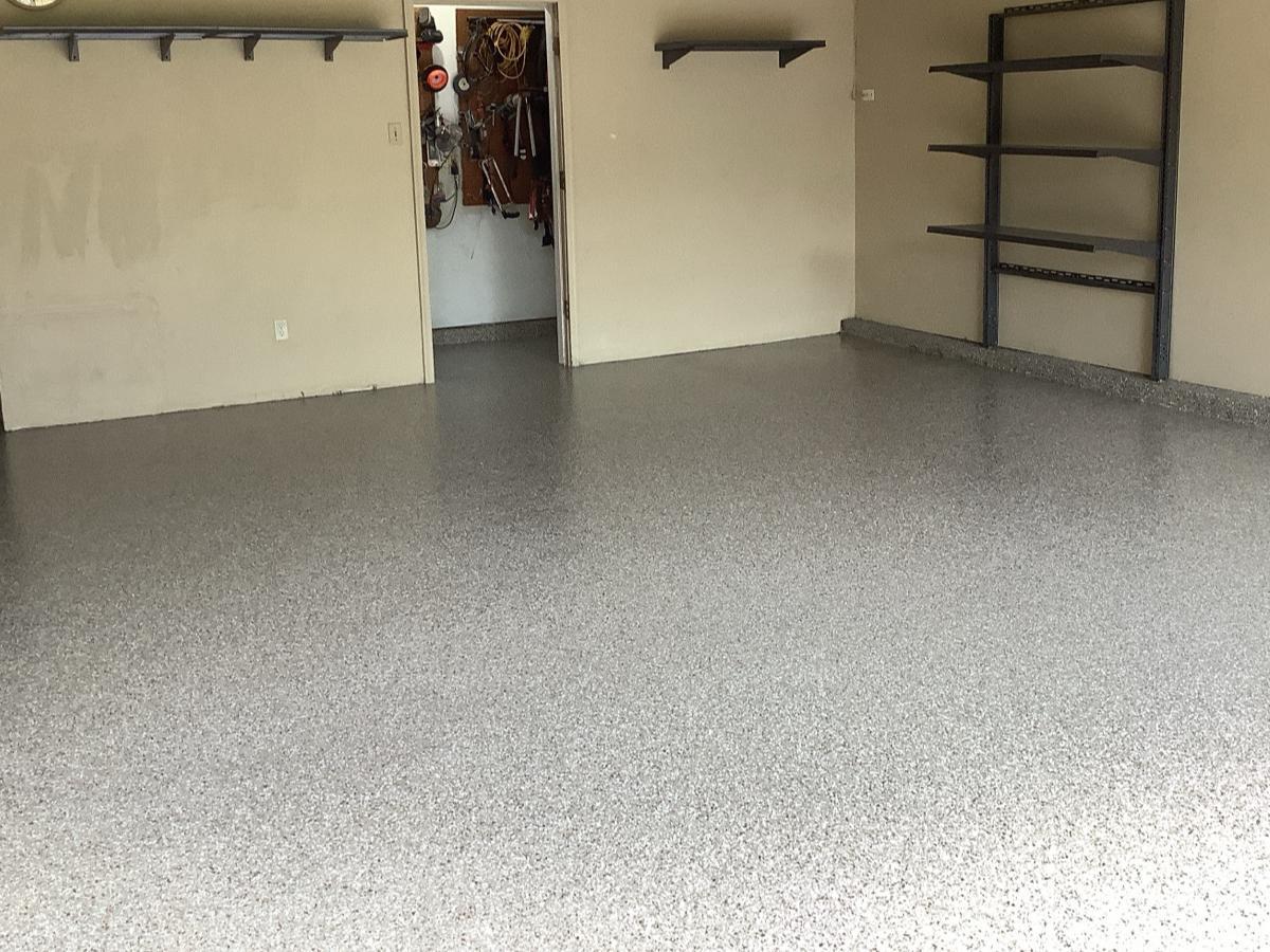 Garage with new shelving and concrete coating